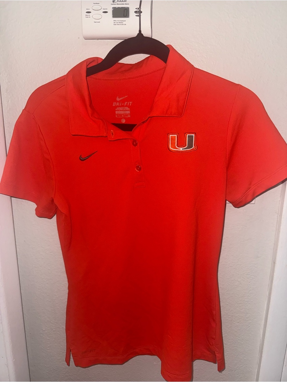 Nike Women’s Bright Orange Short-Sleeve Dri-FIT Polo with U Patch